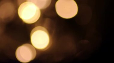 Colorful Christmas lights as multi colored chain of lights for a happy new year and holy eve as festive decoration and ornament for Christmas tree in advent time glowing bright in dark holy night