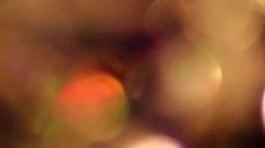 Shiny Christmas lights bokeh background with sparkling bokeh as blurry background for celebration party disco glitter or Christmas eve and a happy new year atmosphere with shining lights and circles