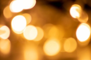 Shiny Christmas lights bokeh background with sparkling bokeh as blurry background for celebration party disco glitter or Christmas eve and a happy new year atmosphere with shining lights and circles