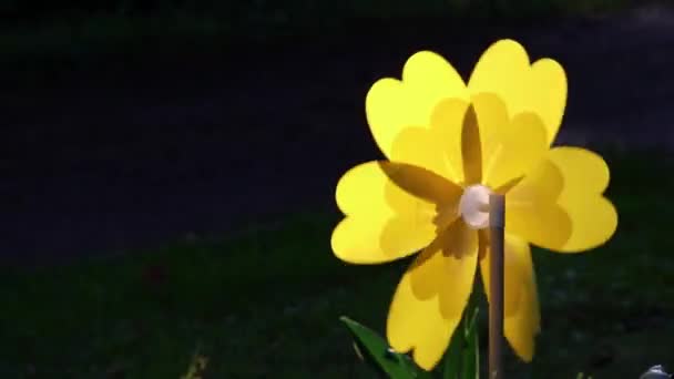 Shiny Vibrant Yellow Wind Mill Pinwheel Whiligig Rotating Summer Breeze — Stock Video