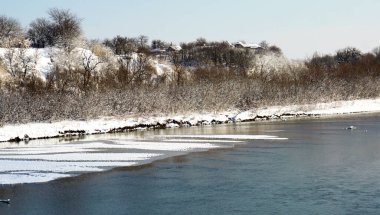 location-Russia, Krasnodar Territory, Ust-Labinsk city, Kuban river. Snow and frost in the Kuban, southern Russia is a very rare occurrence. And therefore both adults and children rejoice in snow. Nature is amazing.. 