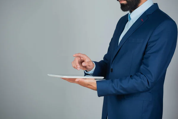 man hand tablet with finger in screen