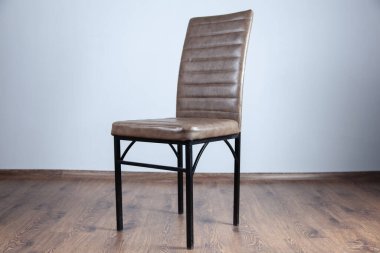 Brown leather chair in studio