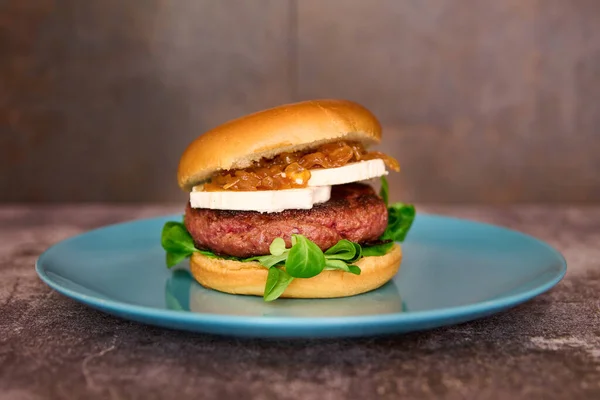 hamburger with french fries on chalkboard background