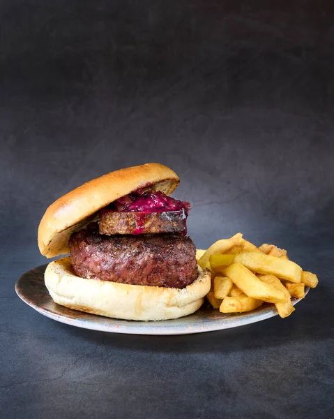 hamburger with french fries on chalkboard background