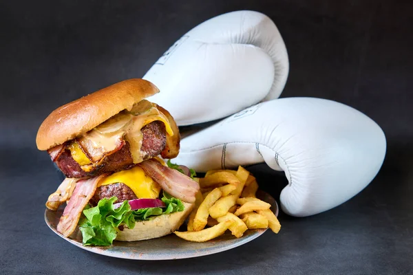 hamburger with french fries on chalkboard background