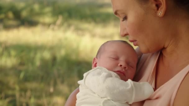 Happy Mother Holds Baby Her Arms Outdoors Cute Infant Sleeps — Stock Video