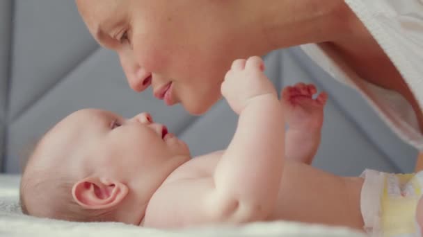 Mother Playing Kissing Her Newborn Baby Happy Mom Spends Time — Stock Video