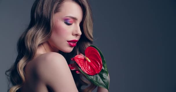 Sexy Blonde Woman Red Lips Holds Red Flower Fashion Model — Stock Video