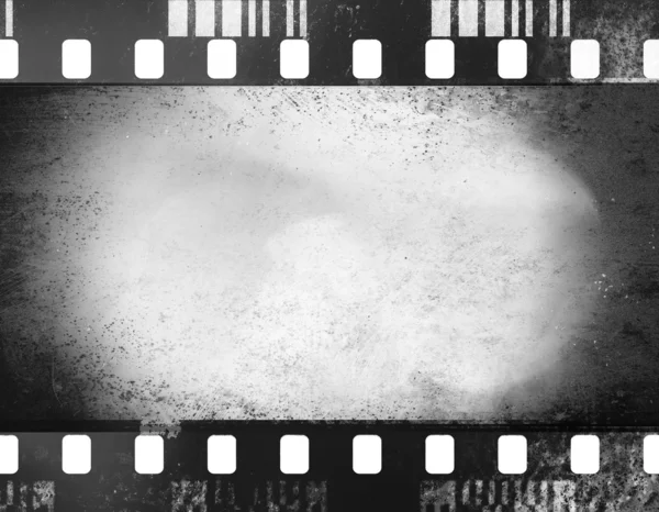 A black and white grunge film frame with white empty space inside — Stock Photo, Image