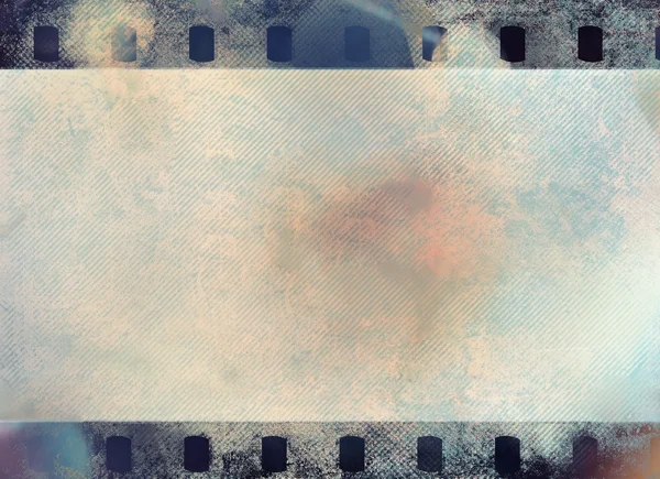 Great colour dark film strip for textures and backgrounds with light leak — Stock Photo, Image