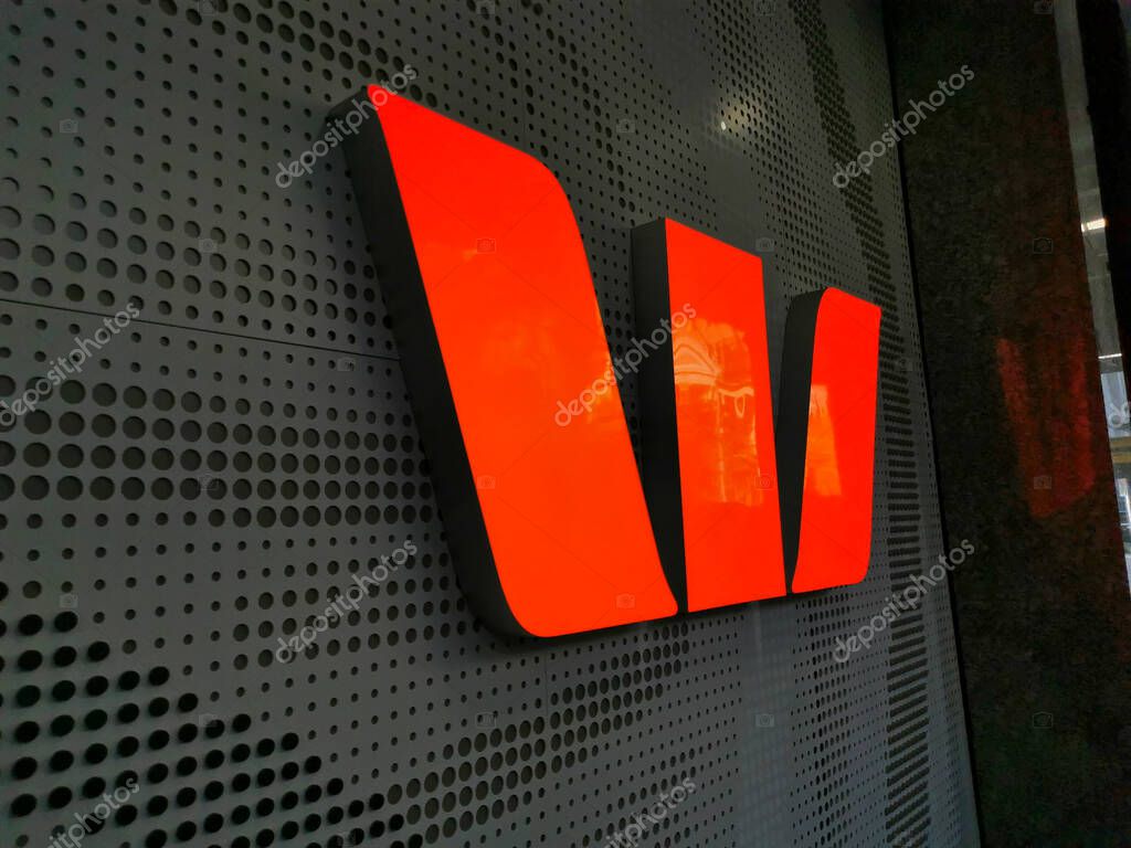 BRISBANE, AUSTRALIA - MAY 19, 2020: Banner logo of Westpac Bank flagship headquarters office in Brisbane Central Business District on Queen Street.