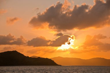 Sunset scene of peaceful serene mountain island in the Pacific Ocean of Hamilton Island in Queensland Australia