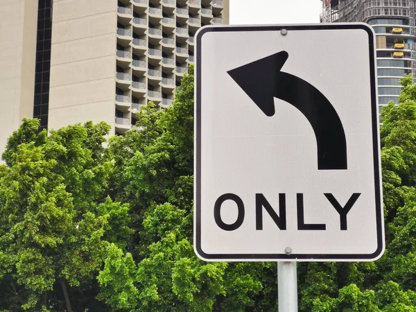 Traffic Signal Sign Turn Left Only Lush Green Trees City — Foto Stock