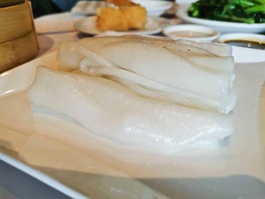 Flat white thick noodle wide skin in Chinese Yum Cha restaurant