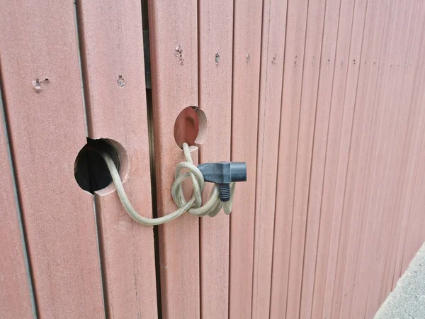 Locking Security Cable Tied Two Wooden Doors — Stock Photo, Image
