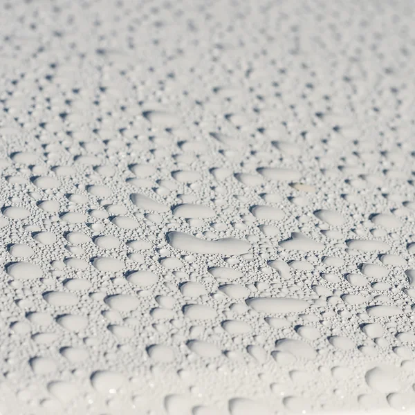 Muitas gotas de água no fundo — Fotografia de Stock