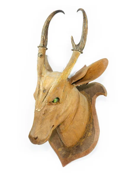 Carved wooden deer head isolated on white background — Stock Photo, Image