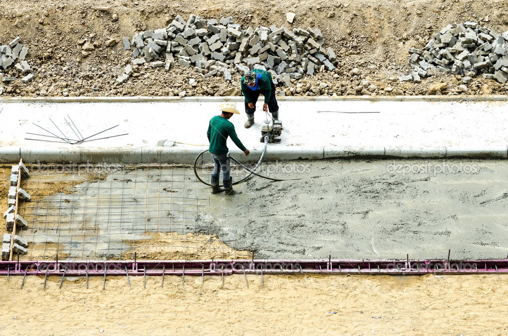 Pouring cement during sidewalk upgrade