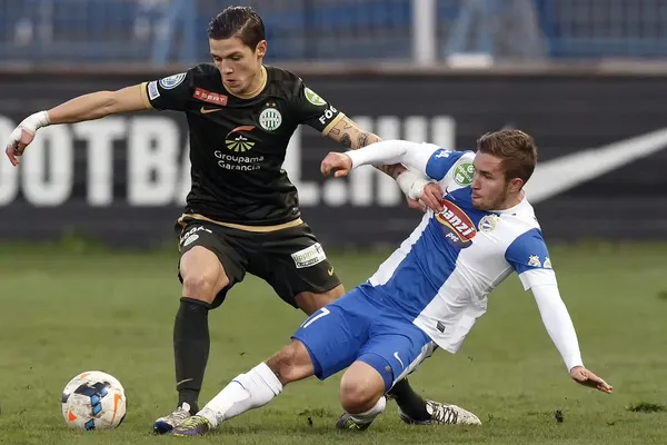 BUDAPEST, HUNGARY - MAY 7: Muhamed Besic of Ferencvarosi TC runs with the  ball during the Hungarian OTP Bank Liga match between Ferencvarosi TC and  MTK Budapest at Groupama Arena on May