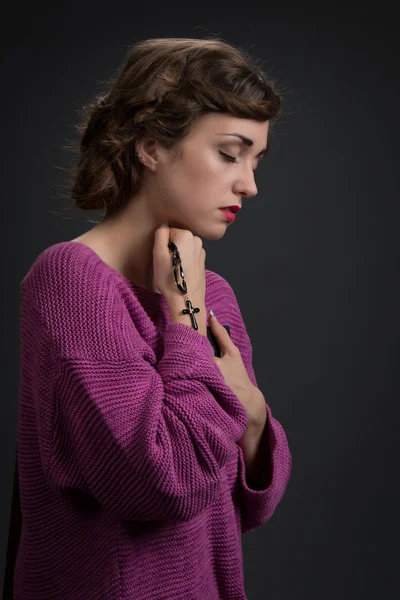 Woman with cross and psalm book — Stock Photo, Image