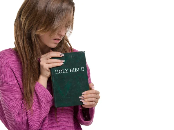 Young christian woman holding the Holy Bible — Stock Photo, Image