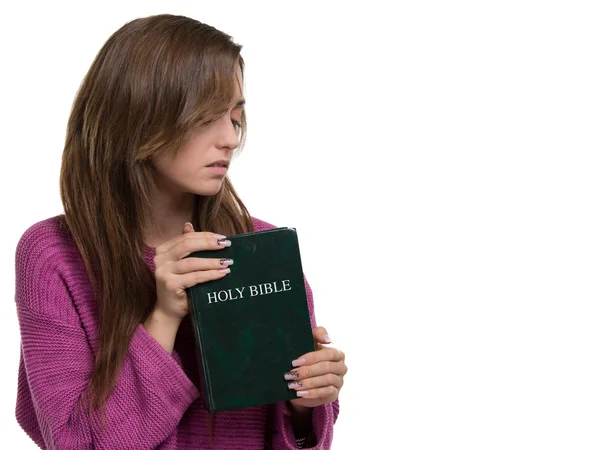 Young christian woman holding the Holy Bible — Stock Photo, Image