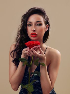 Sexy girl in little black dress with a red rose clipart