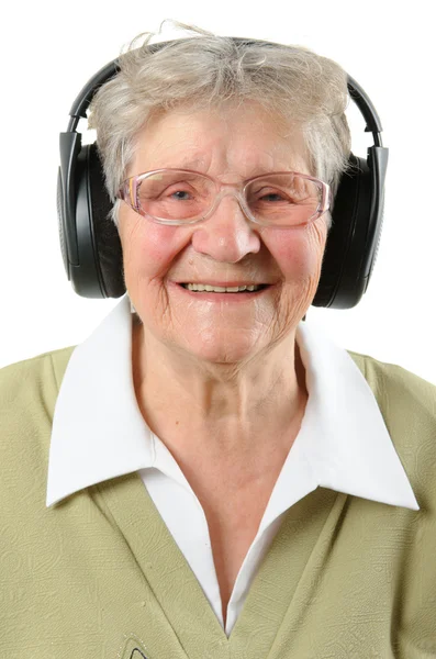 Mujer mayor con auriculares — Foto de Stock