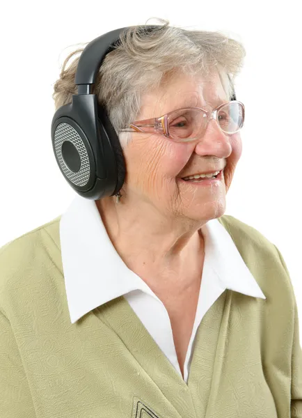 Mujer mayor con auriculares — Foto de Stock