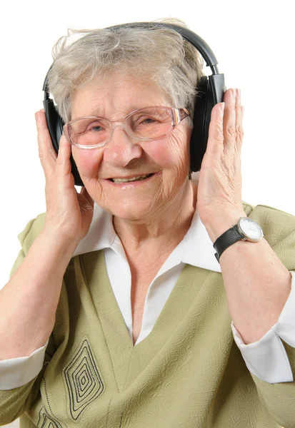 Mujer mayor con auriculares — Foto de Stock