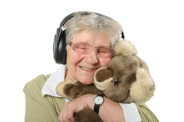 Seniorin mit Kopfhörer — Stockfoto