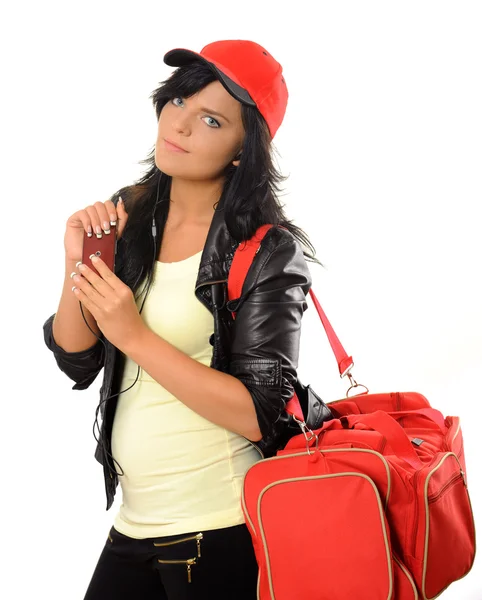 Mujer joven con una bolsa y teléfono — Foto de Stock