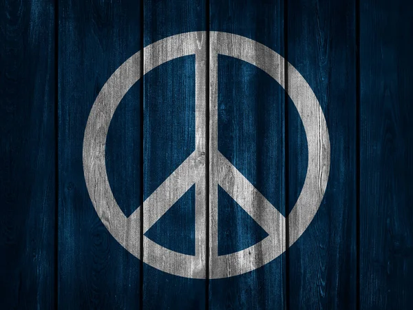 Ιστορικό Ειρήνης Λευκό Σύμβολο Της Ειρήνης Σκούρο Μπλε Ξύλινο Φόντο — Φωτογραφία Αρχείου