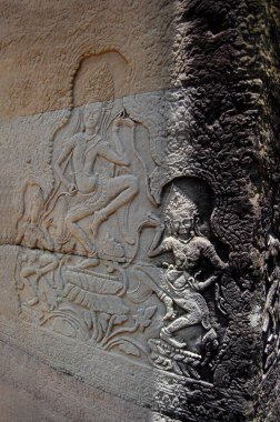 Heykel apsaras ya da Apsara melek tanrısı Prasat Bayon Şatosu 'nun kadın ruhu ya da Kamboçya halkı için Jayagiri Brahma Tapınağı ve Siem Reap, Kamboçya' daki Angkor Thom Wat 'a seyahat ziyaretleri