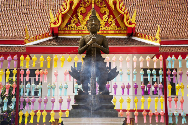 King Thao Wessuwan or Vasavana Kuvera giant statue for thai people travel visit respect praying holy deity mystery at Wat Phang Muang temple in Si Prachan of Suphanburi city in Suphan Buri, Thailand