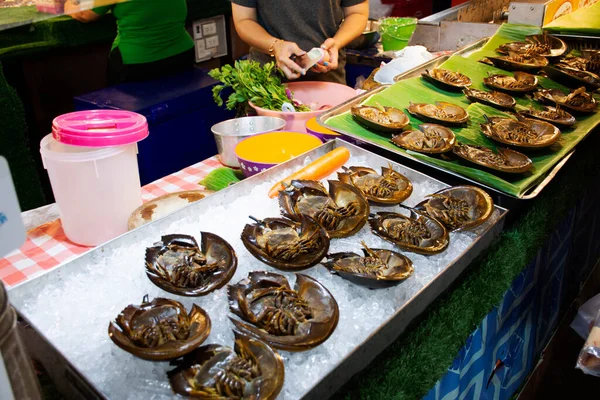 Tachypleus gigas or horseshoe crab for chef cooking spicy sour salad for sale thai people travel visit at Local Talad Nam Lumphaya temple or Wat Lam Phaya Floating Market in Nakhon Pathom, Thailand