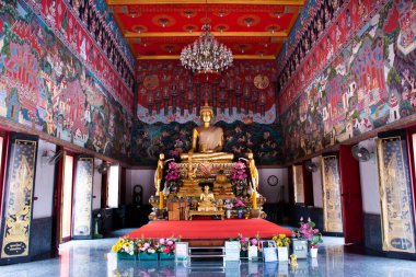 Ancient buddha statues in old ubosot church for thai people traveler travel visit and respect praying blessing holy worship in Wat Bot Bon temple at Bang Kruai on April 9, 2022 in Nonthaburi, Thailand