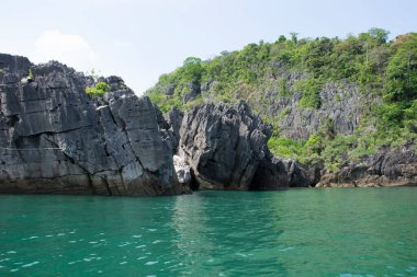 View landscape rock stone of Prasat Hin Pan Yod island beach in sea or ocean of Ko Khao Yai in Mu Ko Petra National Park for thai people travelers travel visit in Pak Bara at La ngu of Satun, Thailand
