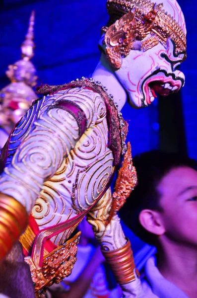 Ancient puppets toy or antique marionette thai style for playing acting on stage show thai people and foreign travelers travel visit festival event fair in night time at Sam Yan in Bangkok, Thailand
