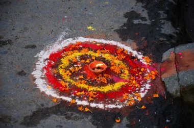 Sacrificial offering and Rangoli powder or sand paint coloured nepalese style for nepali people respect praying rite offer to deity in diwali festival of lights of major celebrated in Kathmandu, Nepal