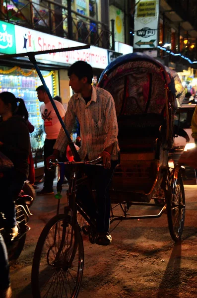 Parade of Nepalese people for celebration and respect praying rite to deity in diwali festival of lights of nepali ancient tradition in night time at Thamel city on November 3, 2013 in Kathmandu Nepal