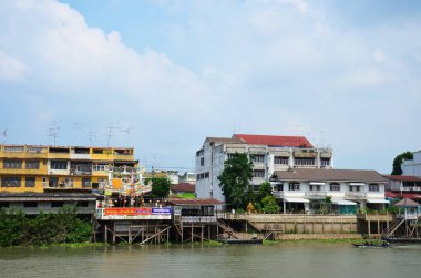 Local boat ship ferry transport stop at port pier send receive thai people passengers and foreign travelers crossing chao phraya river in Ayutthaya on May 1, 2014 in Phra Nakhon Si Ayutthaya, Thailand