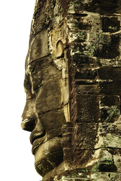 Rostos de pedra esculpida no templo antigo em Angkor Wat, Camboja — Fotografia de Stock