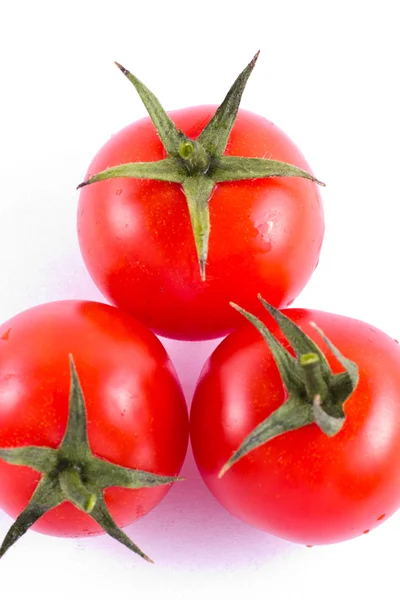 Three fresh cherry tomatoes — Stock Photo, Image