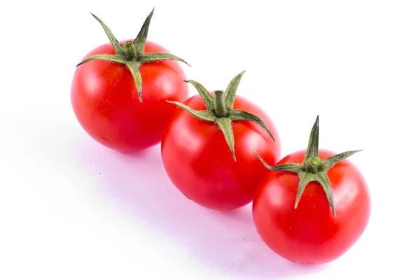 Tres tomates cherry frescos — Foto de Stock