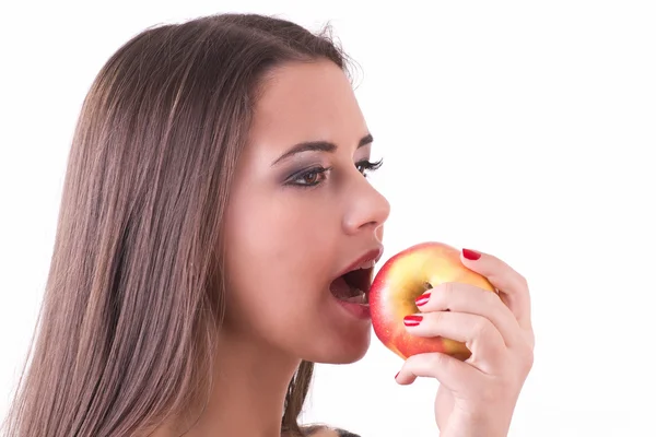Mladá žena jí jablka — Stock fotografie
