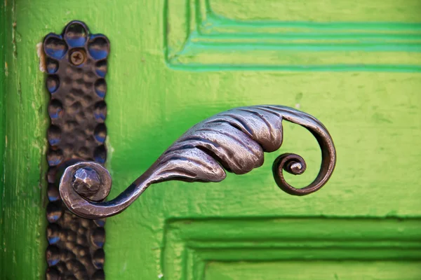 Old wrought iron door handle — Stock Photo, Image