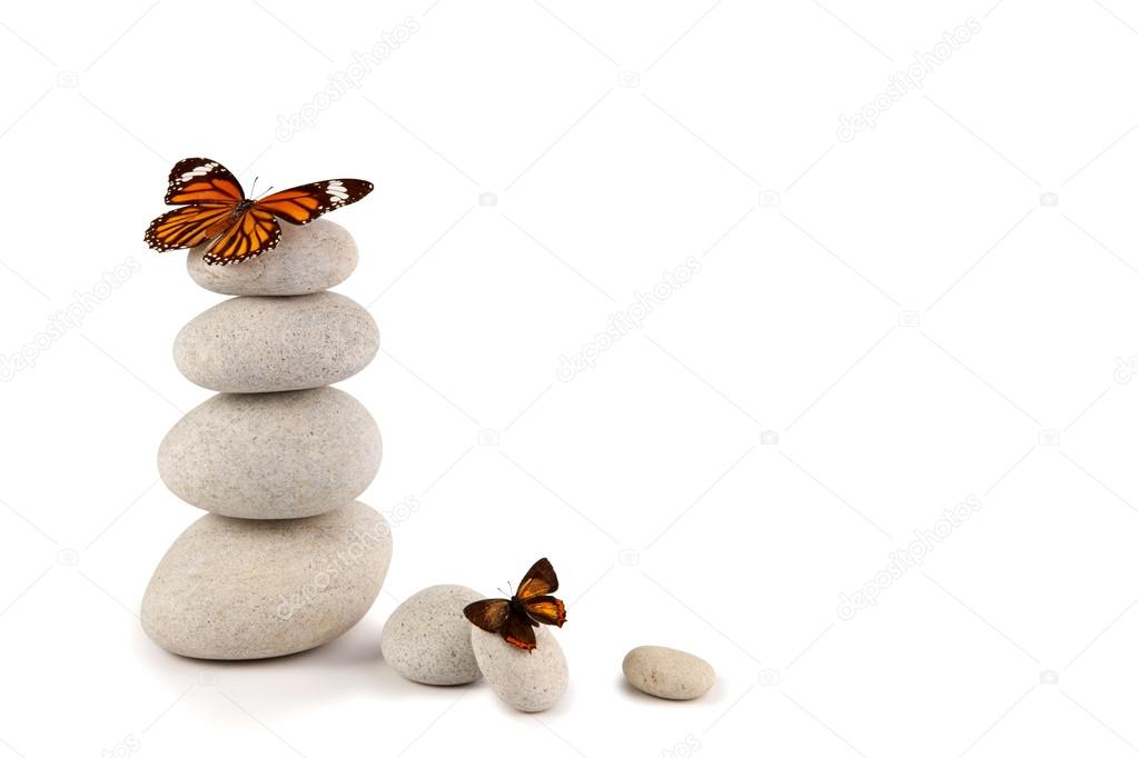 Balanced stones with butterflies