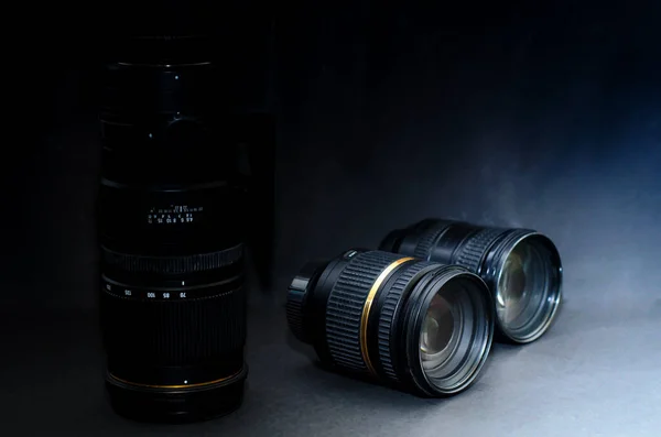 Zoom lenses and wide lenses on a black background, isolated